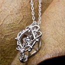 【鑑別書付】ダイヤモンドペンダント/ネックレス 0.05ct K10 ホワイトゴールド アラベスク フラワーモチーフ 鑑別書付き